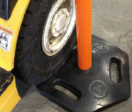 Picture of a forklift rolling over the durable rubber base