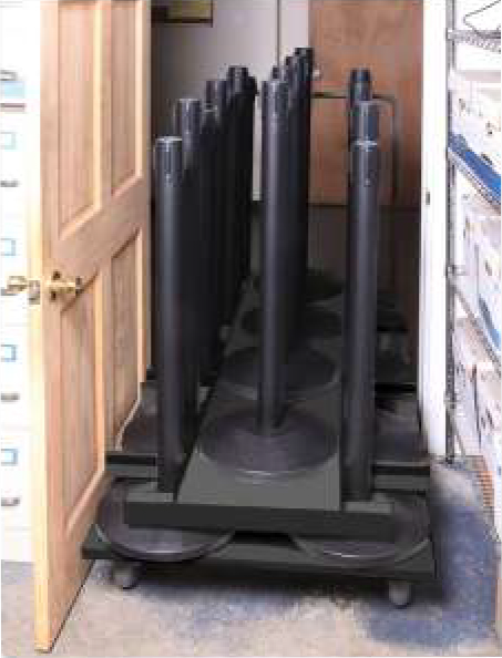 A fully loaded convenient stanchion cart going through a doorway